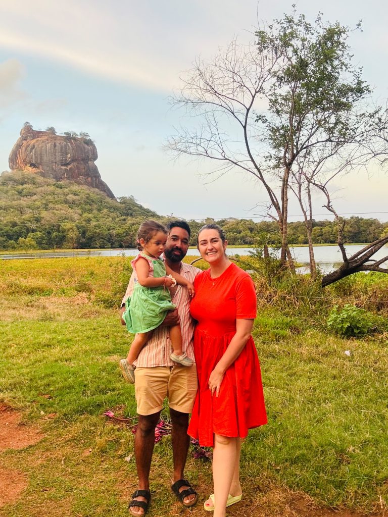 Family in front of ancient Sigiriya Rock Fortress during Sri Lanka holiday with Olanka Tours